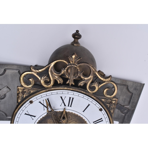 217 - An early 20th century Marie Louise wall / bracket clock. Chain and weights with 8-day movement. The ... 