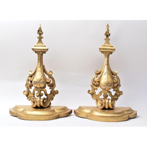 391 - A pair of 19th century Florentine giltwood wall brackets. Each bracket of traditional form, with ser... 