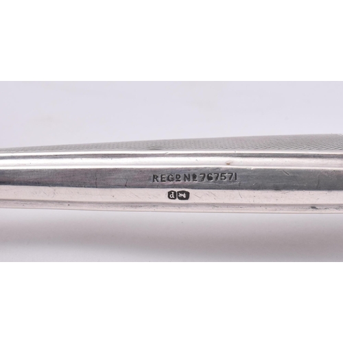 25 - A hallmarked silver handled stainless steel shoe horn. The main body of the shoe horn made from stai... 