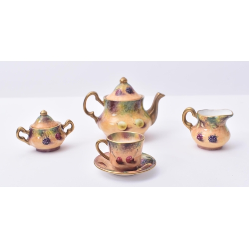 11 - Terence Nutt for Royal Worcester - A later 20th century fine bone hand painted miniature tea service... 