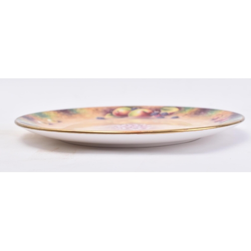 650 - Terence Nutt for Royal Worcester - A later 20th century fine bone china signed hand painted side pla... 