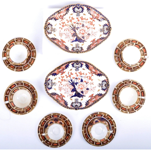 331 - Royal Crown Derby - A collection of 20th century Imari pattern porcelain comprising six cups, saucer... 