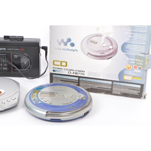 402 - A collection of vintage retro 20th Century cassette and compact disc players. Lot to include Walkman... 