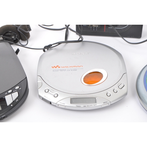 402 - A collection of vintage retro 20th Century cassette and compact disc players. Lot to include Walkman... 