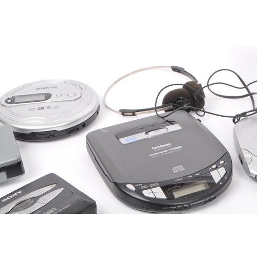 402 - A collection of vintage retro 20th Century cassette and compact disc players. Lot to include Walkman... 