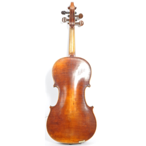 427 - A 20th Century full sized 4/4 violin musical instrument with two piece back and purfling edge - unla... 