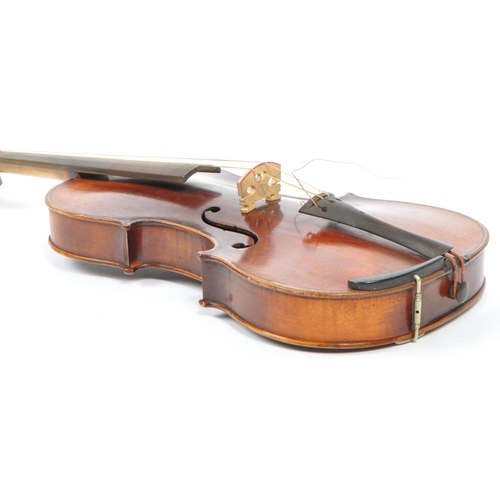 427 - A 20th Century full sized 4/4 violin musical instrument with two piece back and purfling edge - unla... 