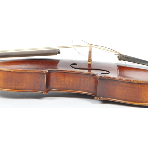 427 - A 20th Century full sized 4/4 violin musical instrument with two piece back and purfling edge - unla... 