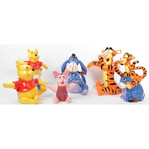 71 - A collection of six Border Fine Arts studio china porcelain Winnie the Pooh novelty with mark to bas... 