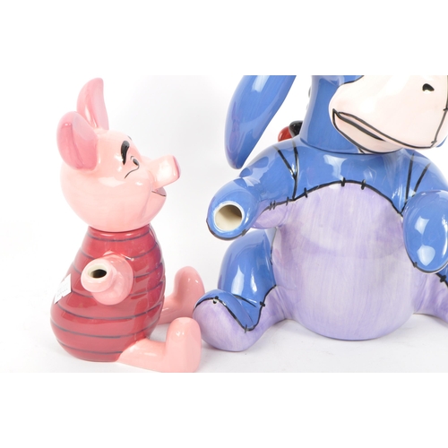 71 - A collection of six Border Fine Arts studio china porcelain Winnie the Pooh novelty with mark to bas... 