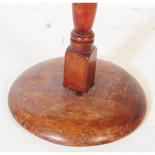 348 - A vintage 20th century mahogany pedestal free standing floor standing ashtray. The ashtray having me... 