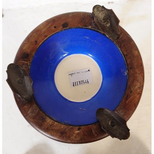 348 - A vintage 20th century mahogany pedestal free standing floor standing ashtray. The ashtray having me... 