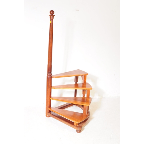 1042 - A 19th century revival mahogany set of library steps. Turned column with spindle gallery rails havin... 