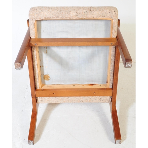 554A - British Modern Design - A vintage 1960's mid 20th century teak wood chair. Having beige fabric cushi... 