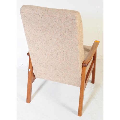 554A - British Modern Design - A vintage 1960's mid 20th century teak wood chair. Having beige fabric cushi... 