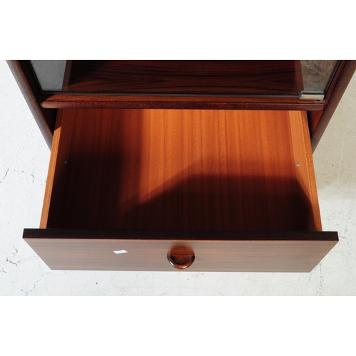 583 - A contemporary mahogany veneered music audio record cabinet. Rectangular form with single glazed doo... 