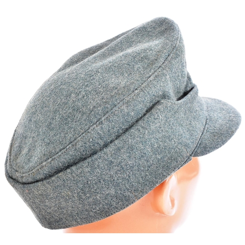 110 - A WWII Second World War Third Reich Nazi German Field Police M43 forage cap. Green wool with a front... 