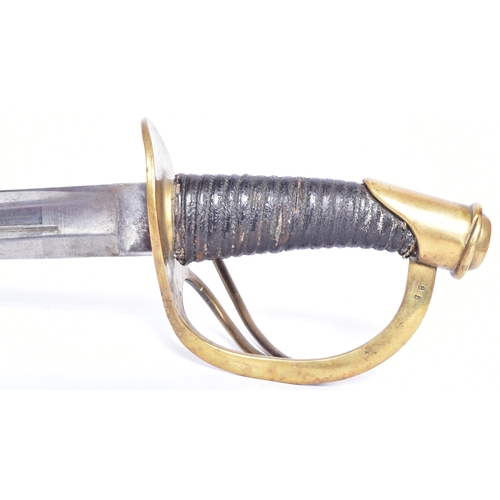 115 - A 19th Century French Heavy Cuirassier Troopers sword. Canted brass pommel, leather and brass twist-... 