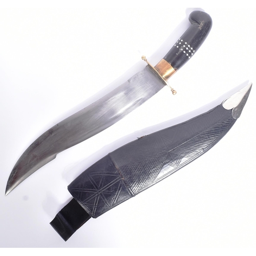 118 - A vintage Indian variation of a Nepalese / Gurkhas Kukri knife. The knife having a hooked pommel wit... 