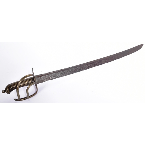 122 - A late 18th Century believed British Infantry Hanger Sword. Ribbed brass grip, half basket hilt and ... 