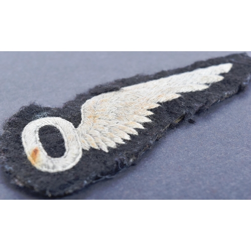 128 - A WWII Second World War British RAF Royal Air Force Observers patch. A white stylized wing attached ... 