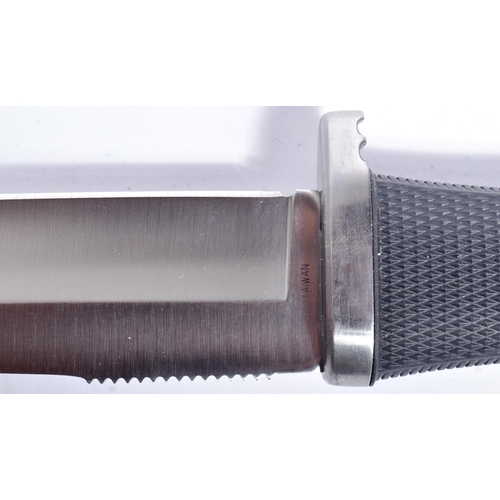 139 - An original American SOG made ' Tsunami ' knife model ST-01. Kraton grip with checkered texture and ... 