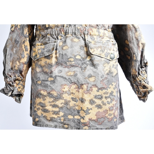 142 - A WWII Second World War Third Reich Nazi German Waffen SS Officers uniform smock. Desert camo with s... 