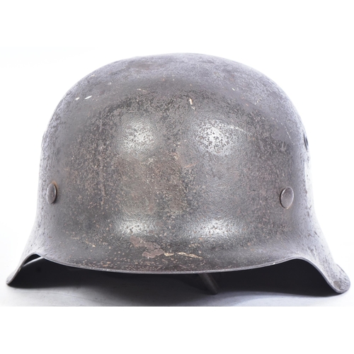 150 - An original WWII Second World War Third Reich Nazi German Army M42 pattern steel Stahlhelm. Single H... 