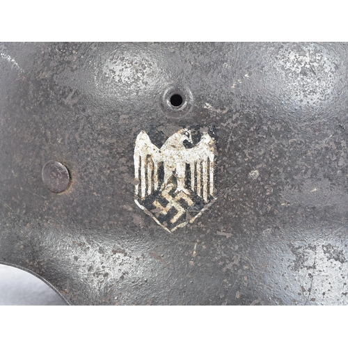 150 - An original WWII Second World War Third Reich Nazi German Army M42 pattern steel Stahlhelm. Single H... 