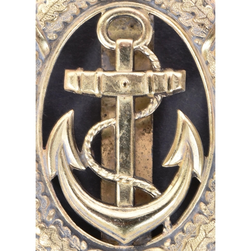 195 - A WWII Second World War Third Reich Nazi German Kriegsmarine Officer of the Watch badge. Gilt metal ... 