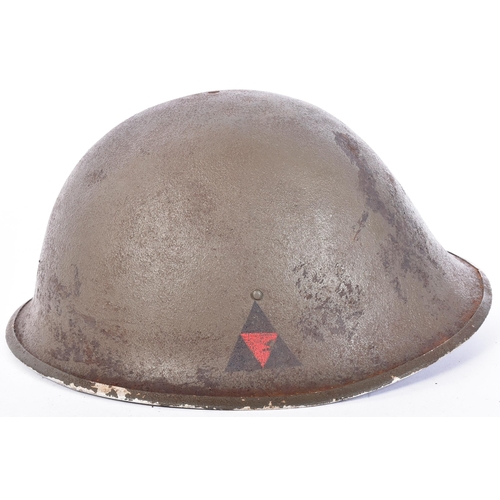 21 - A WWII Second World War British MKIII / 1944 pattern D Day helmet. Typical form with ' turtle ' shap... 