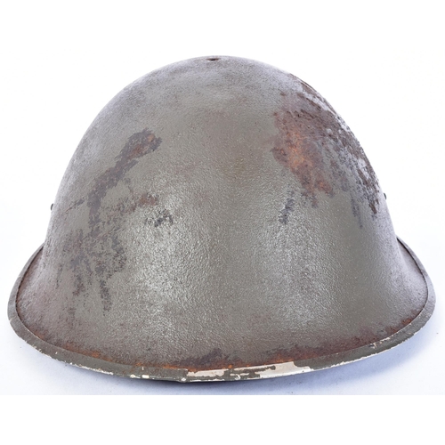 21 - A WWII Second World War British MKIII / 1944 pattern D Day helmet. Typical form with ' turtle ' shap... 