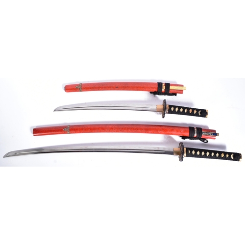 213 - Two vintage Japanese style swords comprising a full size Katana and a matching Wakizashi. Both with ... 