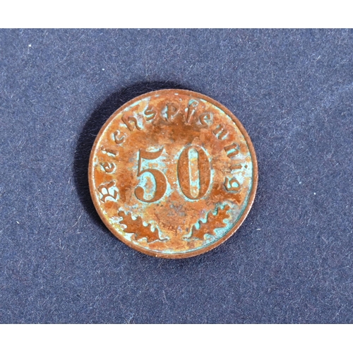 216 - A WWII Second World War Third Reich Nazi German Waffen SS canteen token for 50Pf. Marked with SS run... 