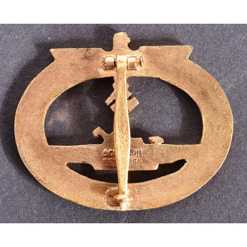 225 - A WWII Second World War Third Reich Nazi German Kriegsmarine U-Boat War badge. The badge having a wr... 