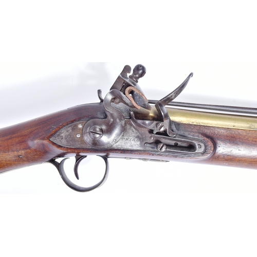 234 - Twigg of London - an early 19th century brass-barrelled flintlock blunderbuss gun with sprung bayone... 