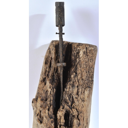 38 - A WWI First World Imperial German Army Mauser rifle bayonet relic impaled on a large tree branch. By... 