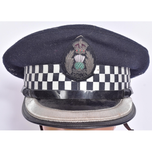 394 - An original vintage Scottish Chief Inspector Police uniform hat / cap. The flat peaked cap having a ... 