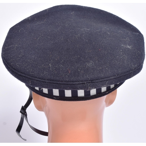 394 - An original vintage Scottish Chief Inspector Police uniform hat / cap. The flat peaked cap having a ... 