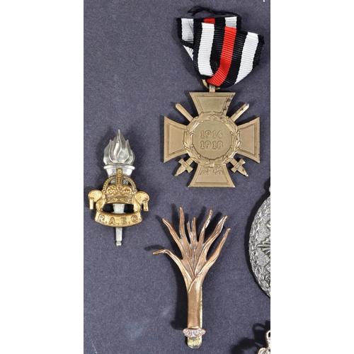 398 - A collection of assorted Military pins and cap badges to include; Highland Regiment, Scottish. 6th (... 