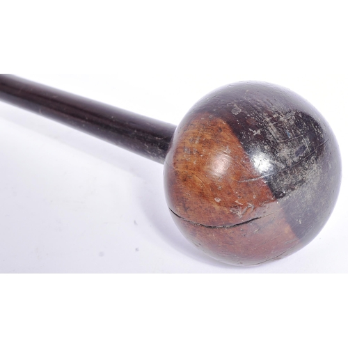 44 - A mid 20th Century South African Zulu tribal club / Knobkerrie club. Globular shaped club head mount... 