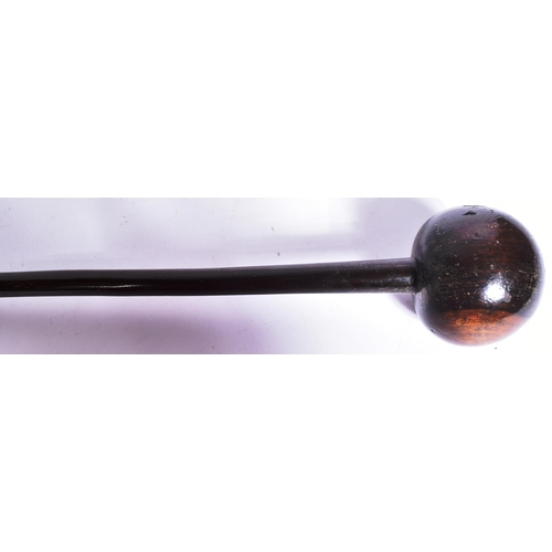 44 - A mid 20th Century South African Zulu tribal club / Knobkerrie club. Globular shaped club head mount... 