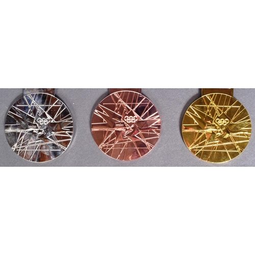 47 - London 2012 Olympic Games - a collection of x3 replica London Olympics medals comprising gold, silve... 