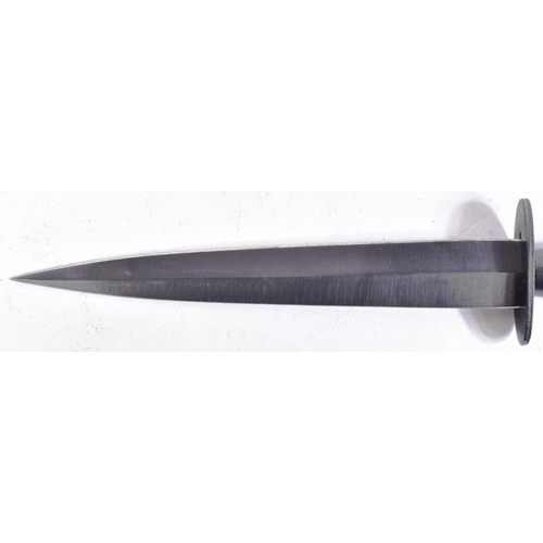 54 - An original current issue FS Fairbairn Sykes British commando knife dagger. The knife having a nut t... 