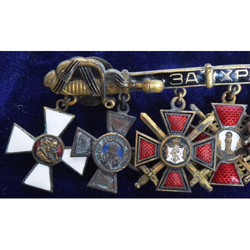 57 - Russian Civil War interest - a collection of original Russian Civil War era miniature medals mounted... 