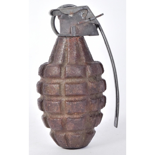 61 - A WWII Second World War US United States Army MK2 pineapple grenade. Cast iron grooved surface with ... 