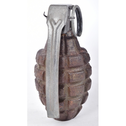 61 - A WWII Second World War US United States Army MK2 pineapple grenade. Cast iron grooved surface with ... 