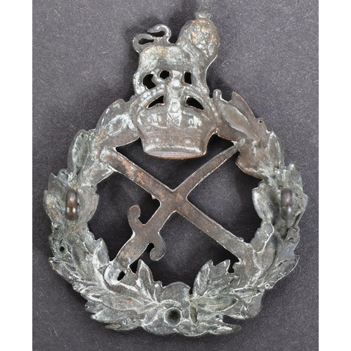 62 - A WWI First World War British Army Generals cap badge with a central crossed baton and sabre beneath... 