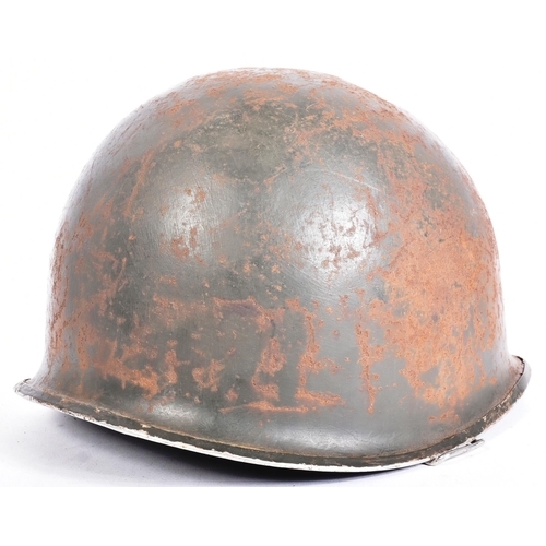 65 - A WWII Second World War US United States M1 steel combat helmet badged to the Tank Destroyer unit. A... 