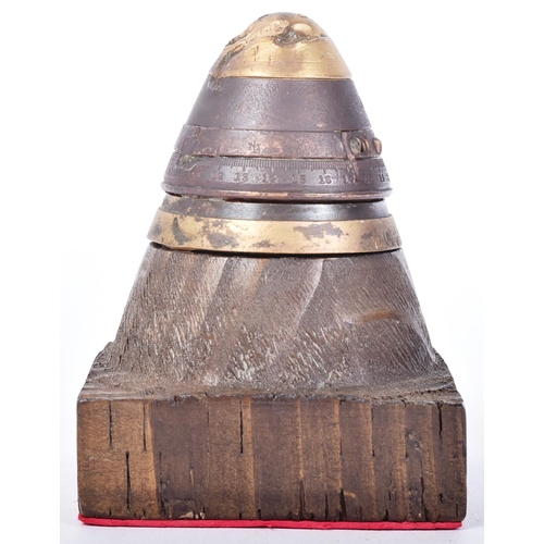 67 - A WWI First World War British 18 Pdr shrapnel shell case fuse fashioned into a paperweight. A small ... 